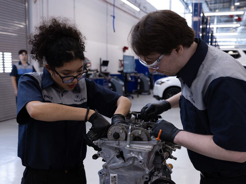 students_feature_800x600 HondaPACT students working on engine