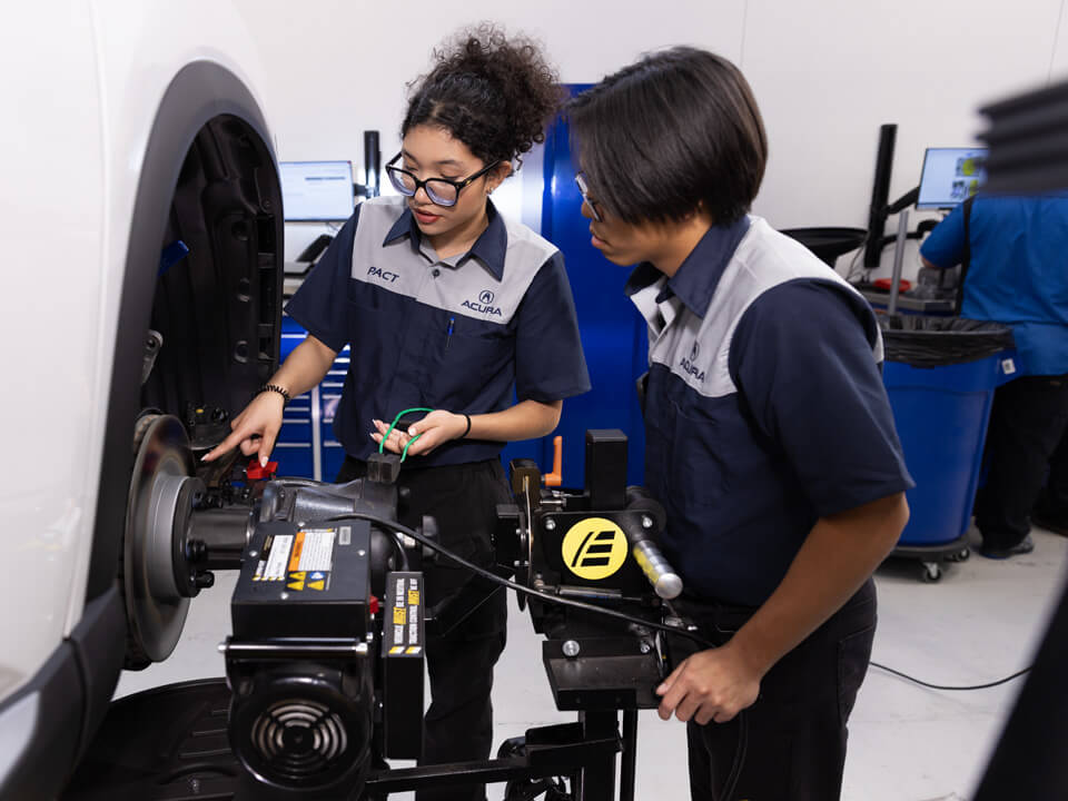 what_is_PACT_2b HondaPACT students working brake system